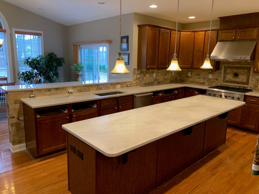 White quartzite kitchen countertops in a large kitchen