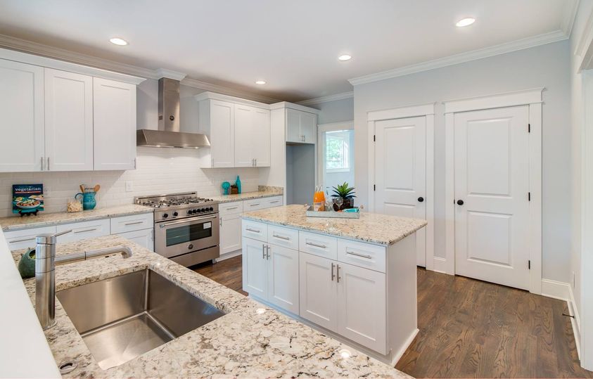 Modern white Kitchen with white granite countertop 