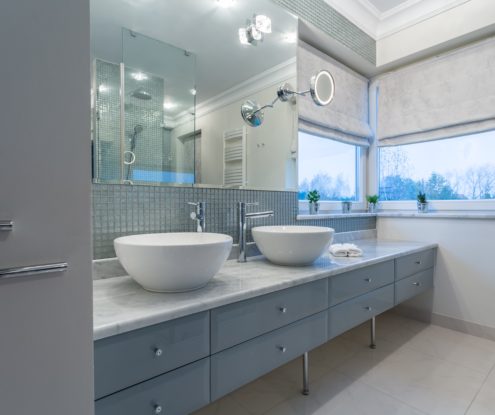 White bathroom with natural stone countertop