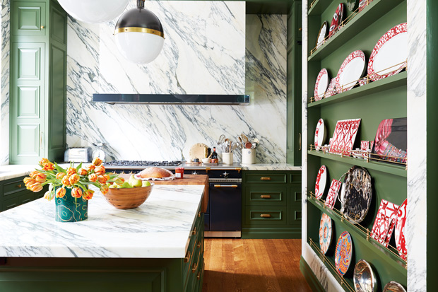 old world white marble kitchen with white marble backsplash and green elements