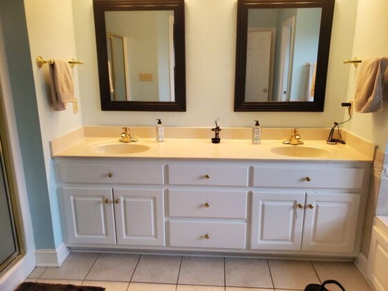 Double sink bathroom vanity with two mirrors