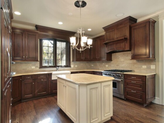 Kitchen with cream island and farmhouse sink