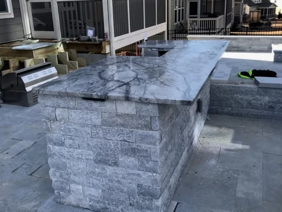 Outdoor stone bar with marble countertop