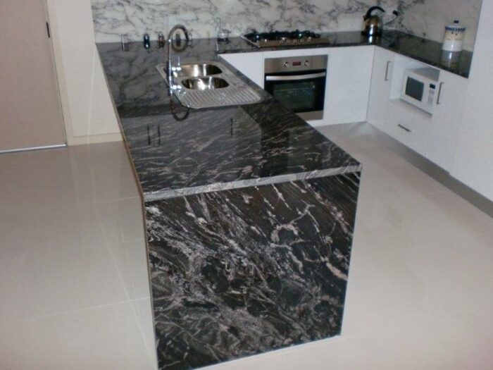 Black forest granite countertops in the Kitchen