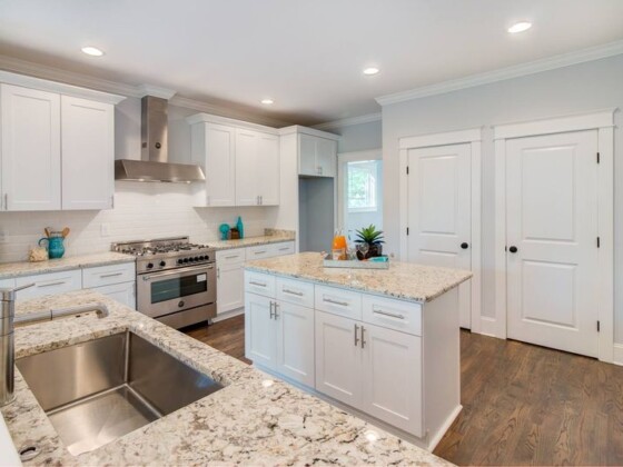 Modern white Kitchen with white granite countertop