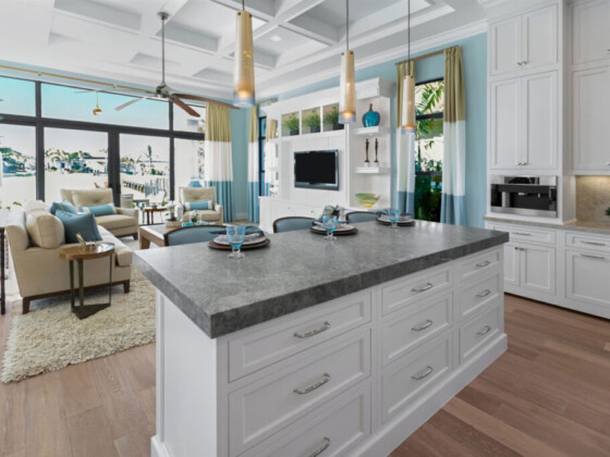 Large grey quartz countertop on white island