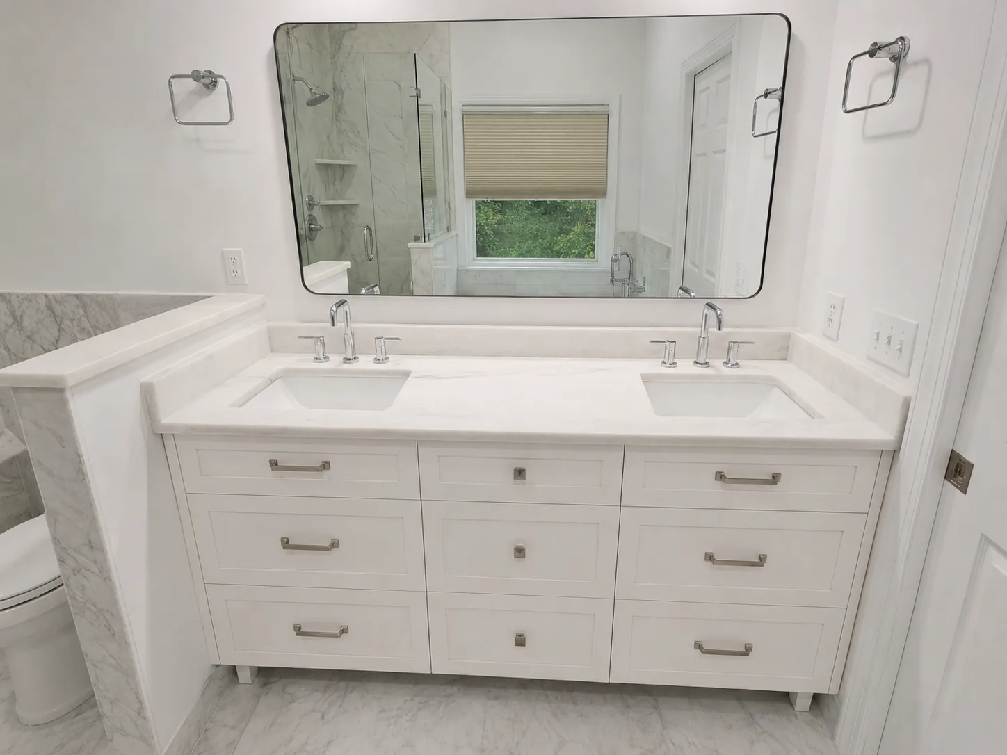 White Afyon marble double vanity in Chapel Hill bathroom