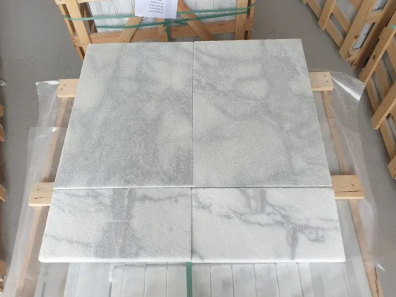 White Carrara Cloud stone pavers displayed at Marble Unlimited's Hillsborough yard
