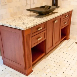 Cherry wood bathroom vanity with granite top