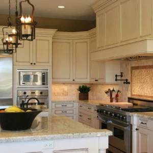 Traditional beige kitchen with island and stainless fridge