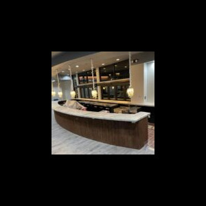 Modern curved marble bar with pendant lights