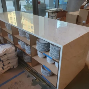 Marble countertop island with stacked bowls
