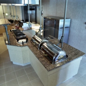 Empty buffet counter with chafing dishes