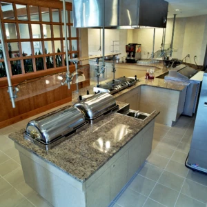 Buffet serving counter with stainless chafing dishes