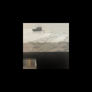 White marble countertop with stainless steel drawer