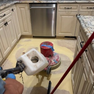 Floor buffer machine polishing kitchen tile floor